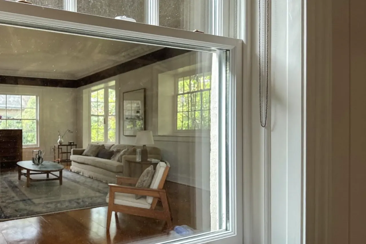 Close-up of an acoustic secondary glazing panel on a sash window