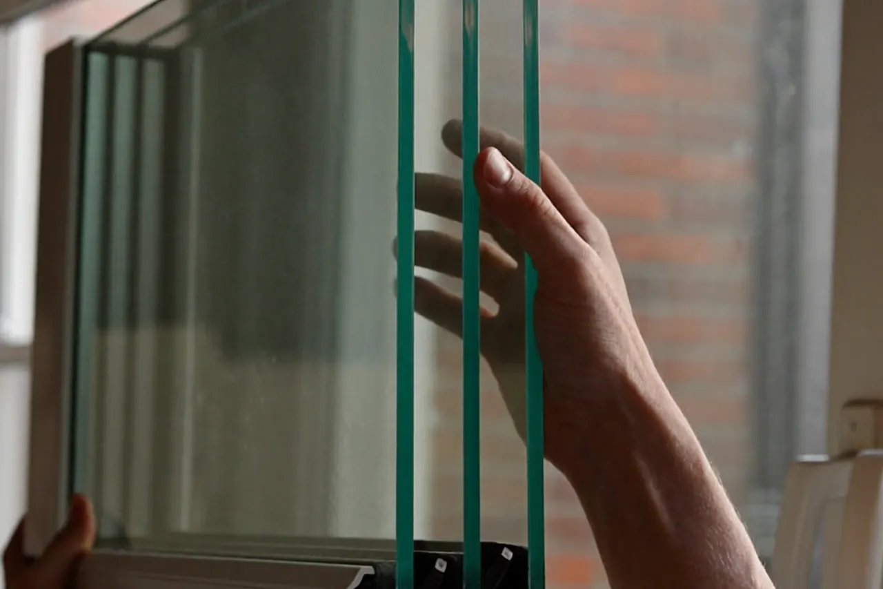 Close-up of the sealed spacer bar along a double-glazed unit edge