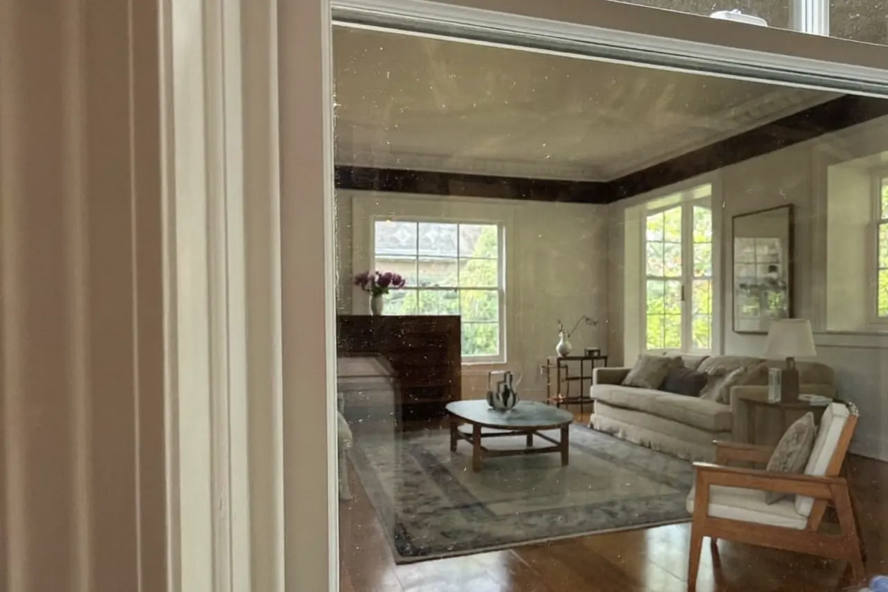 Slim aluminium secondary glazing frame fitted inside an existing window